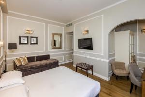 TV a/nebo společenská místnost v ubytování FH55 Hotel Calzaiuoli