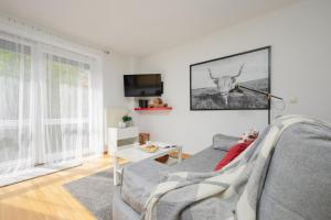 Prostor za sedenje u objektu Sunny Apartment in the Heart of Warsaw by Renters