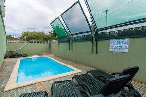 Bazén v ubytování Villa Punta Viktory nebo v jeho okolí