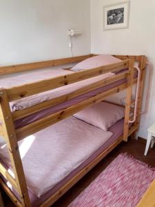 Postel nebo postele na pokoji v ubytování Landhaus up de Warft - Friesenrose
