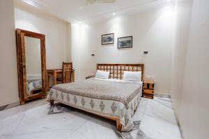 Postel nebo postele na pokoji v ubytování Gumaan Auberge