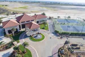 an aerial view of a resort with palm trees at Gold coast beautiful house with private pool in Palm-Eagle Beach