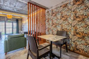a dining room with a table and chairs at Marjoram Otel in Sile