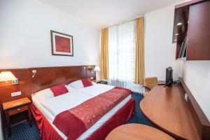 Letto o letti in una camera di Hotel Grand