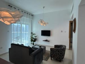 TV a/nebo společenská místnost v ubytování home away vacation rentals