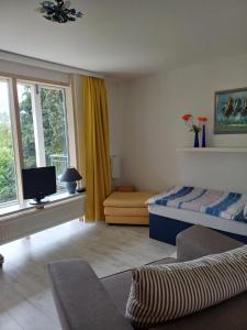 Televisyen dan/atau pusat hiburan di Apartment Flughafen Leipzig