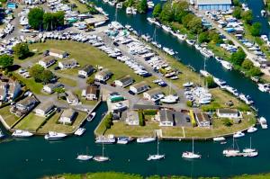 an aerial view of a marina with boats in the water at Stunning Waterfront Lodge in Christchurch