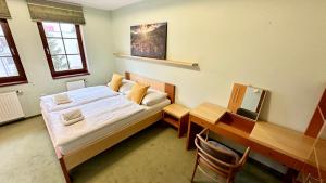 Posteľ alebo postele v izbe v ubytovaní Apartmán Aurora Třeboň