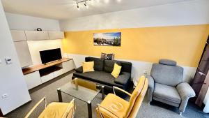 Televízia a/alebo spoločenská miestnosť v ubytovaní Apartmán Aurora Třeboň