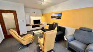 Televízia a/alebo spoločenská miestnosť v ubytovaní Apartmán Aurora Třeboň