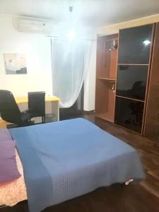 เตียงในห้องที่ 2 bedrooms apartement with city view and balcony at Messina 1 km away from the beach