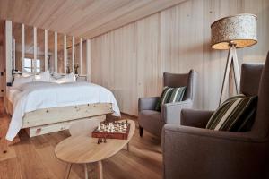Posteľ alebo postele v izbe v ubytovaní Hotel Mohnenfluh