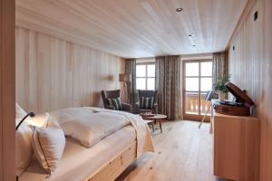 Posteľ alebo postele v izbe v ubytovaní Hotel Mohnenfluh