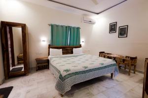 Postel nebo postele na pokoji v ubytování Gumaan Auberge