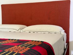 En eller flere senge i et værelse på Casa di design con mini-pool + 39 billeder