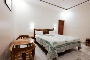 Postel nebo postele na pokoji v ubytování Gumaan Auberge