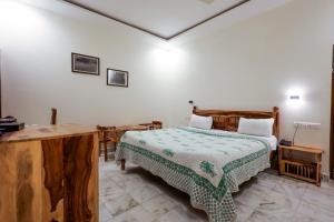 Postel nebo postele na pokoji v ubytování Gumaan Auberge