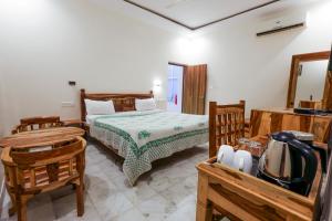 Postel nebo postele na pokoji v ubytování Gumaan Auberge