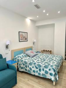 Postel nebo postele na pokoji v ubytování Hedera Capri B&B