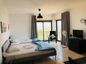 Postel nebo postele na pokoji v ubytování BLife Felicya private rooms
