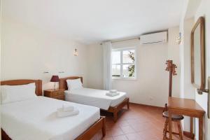 Ένα ή περισσότερα κρεβάτια σε δωμάτιο στο Villa Lydika +26 φωτογραφίες