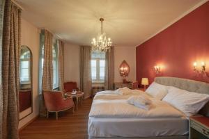 Ένα ή περισσότερα κρεβάτια σε δωμάτιο στο Hotel Schiff am See
