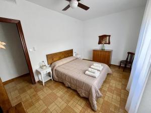 A bed or beds in a room at Casa Teresa