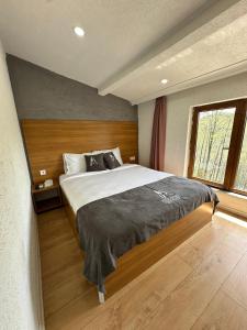 Ένα ή περισσότερα κρεβάτια σε δωμάτιο στο Bungaport Luxury Bungalows&Suits