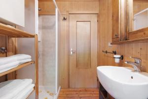 a bathroom with a sink and a toilet and a shower at Natura e Relax in Sacco +32 photos