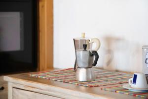 a coffee maker sitting on a table at Natura e Relax in Sacco
