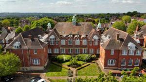 an aerial view of a large red brick building at GuestReady - Luxury haven in Palmers Green in Palmers Green