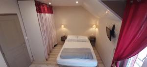 Postel nebo postele na pokoji v ubytování Appartement au cœur du Mont-Dore