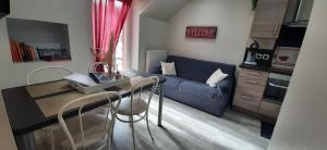 Posezení v ubytování Appartement au cœur du Mont-Dore