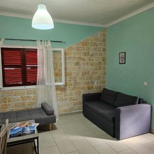 A seating area at The Village Cottage - Benitses