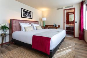 Кровать или кровати в номере Hotel Sacha