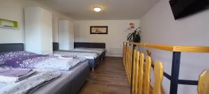 Postel nebo postele na pokoji v ubytování Apartmány u náměstí Sušice