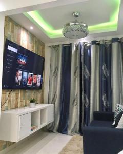 TV a/nebo společenská místnost v ubytování Aparta air