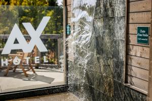 Majutusasutuses AX Hotel olev sertifikaat, autasu, silt või muu dokument