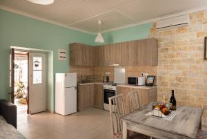A kitchen or kitchenette at The Village Cottage - Benitses