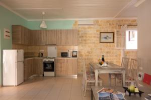 A kitchen or kitchenette at The Village Cottage - Benitses