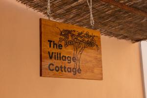The Village Cottage - Benitses tanúsítványa, márkajelzése vagy díja