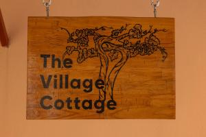 The Village Cottage - Benitses tanúsítványa, márkajelzése vagy díja