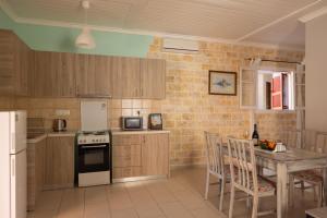 A kitchen or kitchenette at The Village Cottage - Benitses