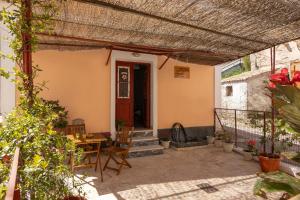 A balcony or terrace at The Village Cottage - Benitses