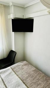 Televízia a/alebo spoločenská miestnosť v ubytovaní Alegria ID156
