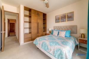 Postel nebo postele na pokoji v ubytování Santamar by Tao Beach Condos with Pool & Walk to Ocean