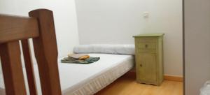 Postel nebo postele na pokoji v ubytování NIOLU