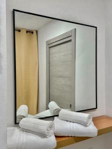A bed or beds in a room at Terme Apartment Levico