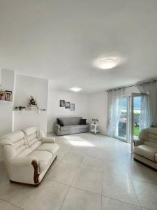 A seating area at Terme Apartment Levico