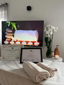 A bed or beds in a room at Terme Apartment Levico
